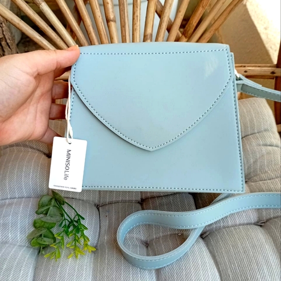 Miniso Handbags - Miniso NWT Pastel Blue Sling Bag
